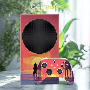 May include: A red and orange gaming console and controller set with a sunset landscape design. The console has a large black circular vent. The controller features the Xbox logo and button layout. The text "OwniDeas" is in the top left corner.