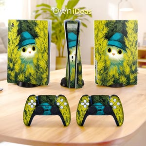 May include: A gaming console and two controllers with a whimsical cat design. The console and controllers feature a cat wearing a blue hat, surrounded by yellow-green foliage. The text "OwniDeas" is visible in the top left corner.