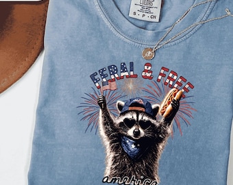 Camiseta de mapache salvaje y libre, camiseta gráfica patriótica del 4 de julio, regalo divertido del Día de la Independencia para él.