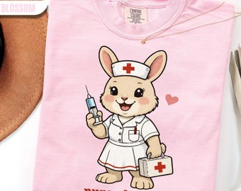 Camiseta gráfica Nurse-Bun-Ny, divertida camiseta médica de conejo, lindo regalo de Pascua para enfermeras registradas, ropa para estudiantes de enfermería, enfermera de parto y alumbramiento.