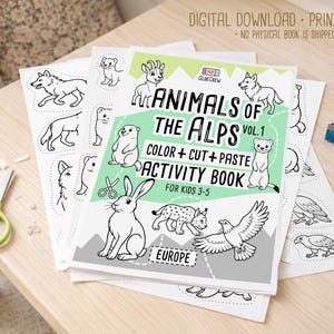 Printable “Animals of the Alps Vol. 1” color, cut-and-paste activity book cover shown with sample black-and-white alpine animal pages spread on a wooden table with scissors and pencils, labeled as a digital download.