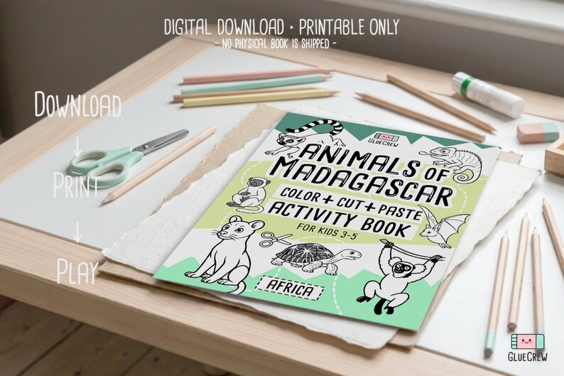 May include: A colorful activity book titled "Animals of Madagascar" with illustrations of various animals. The book is designed for kids aged 3-5 and includes color, cut, and paste activities. Pencils, scissors, and other art supplies are also visible.