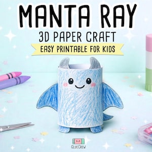 May include: A handmade 3D paper craft manta ray, with blue wings and a smiling face, is the focal point. The image includes crayons, scissors, and a glue stick. Text reads "MANTA RAY 3D PAPER CRAFT EASY PRINTABLE FOR KIDS."
