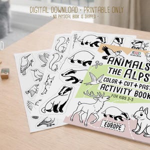 Printable “Animals of the Alps Vol. 2” color, cut-and-paste activity book cover shown with sample black-and-white alpine animal pages on a wooden desk with colored pencils, labeled as a digital download, printable only.