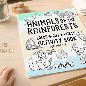 May include: An activity book for children, titled "Animals of the Rainforests." The cover displays line drawings of rainforest animals, such as a monkey and an elephant. The book is for ages 4-6 and includes the text "Color + Cut + Paste".