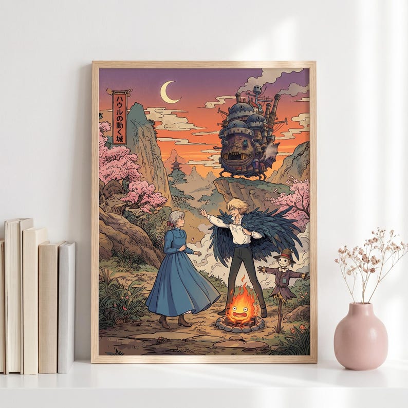 May include: A framed art print featuring a scene from the animated film "Howl's Moving Castle." The artwork depicts characters in a vibrant landscape with a castle, mountains, and cherry blossoms. The text in the image is in Japanese.