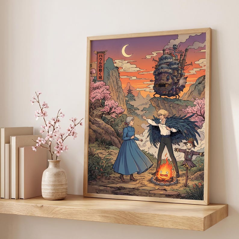 May include: A framed art print featuring a scene from the animated film, Howl's Moving Castle. The artwork depicts characters in a fantasy landscape with a castle, a bonfire, and Japanese text. The color palette includes shades of orange, pink, and blue.