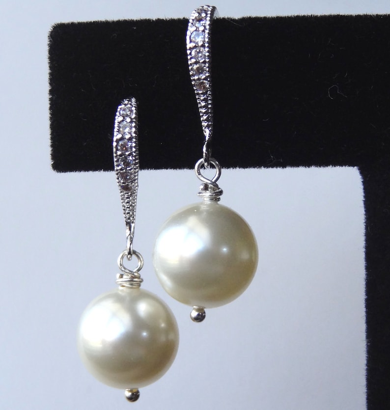 Sterling Silver Cubic Zirconia Pearl Bow Earrings main image 0
