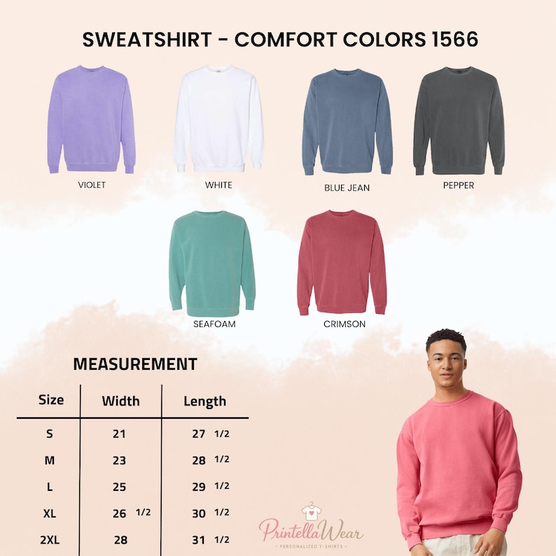 May include: Image of crewneck sweatshirts in violet, white, blue jean, pepper, seafoam, and crimson. A size chart shows measurements in inches, with the smallest size having a width of 21 inches and a length of 27.5 inches. A person models a crimson sweatshirt.