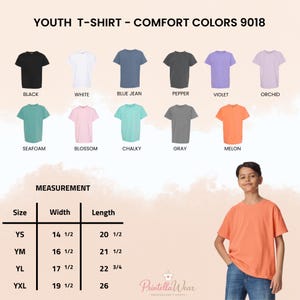 May include: A youth t-shirt in melon colour is modelled in this image. The image also displays a colour chart of t-shirts in various colours, including black, white, blue jean, pepper, violet, orchid, seafoam, blossom, chalky, and grey. Measurement details are also provided.