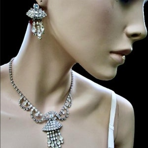 very graceful mid-century deco white rhinestone necklace and screw back earrings ... so elegant and sparkly ... what fairies wear (& brides)