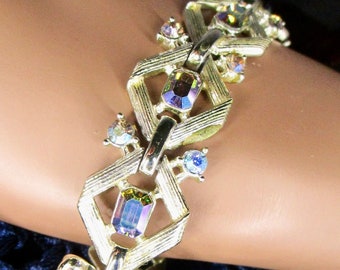 elegant M CM link bracelet with blue borealis rhinestones, signed STAR ... silver tone geometric, 7 inches long, AB effect, vintage 1950s