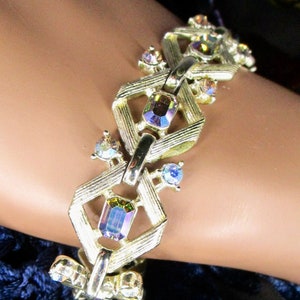elegant M CM link bracelet with blue borealis rhinestones, signed STAR ... silver tone geometric, 7 inches long, AB effect, vintage 1950s