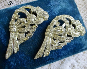 Give yourself wings ... wing-shaped vintage dress clips, matched set, in pot metal with clear rhinestones ... 3 inches long x 1.5