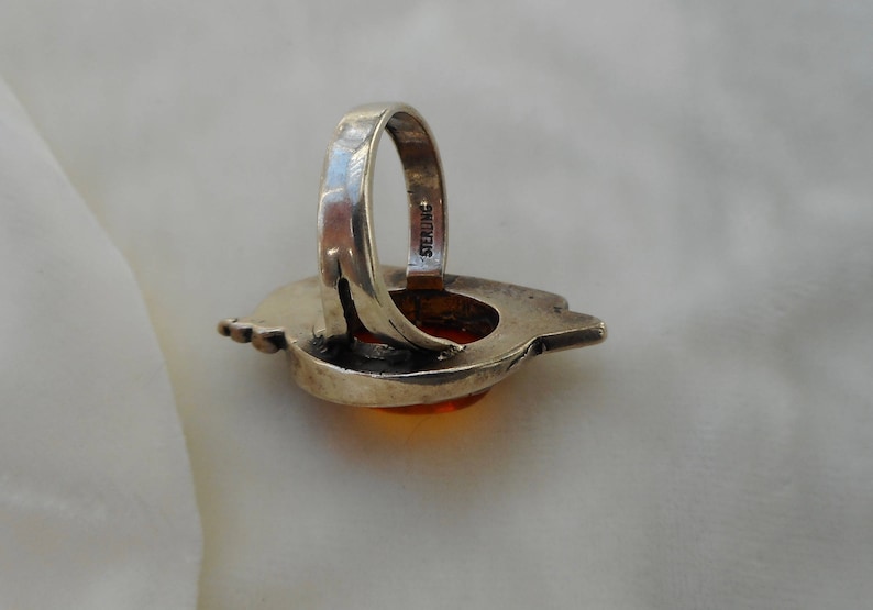 OOAK avant-garde boho western amber ring in modernist silver setting .. a marvel of engineering at size 6 vintage artisanal ..