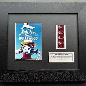 Monty python 1982 original 35mm film cells set within quality wood frame + coa