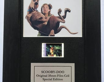 Hand crafted display featuring original mini film cells for a scooby-doo fan