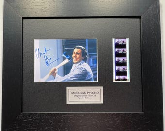 American psycho signed repro + original 35mm film cells in quality wood frame