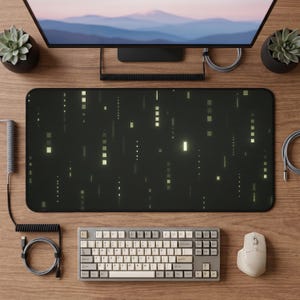 May include: A rectangular desk mat featuring a dark charcoal background with a pattern of vertical, glowing light-yellow square and rectangular digital data streams. The mat has a smooth surface and black stitched edges, positioned on a wooden desk.