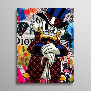 May include: A vibrant pop art canvas print featuring a cartoon duck character wearing a top hat and a patterned coat. The background is a collage of dollar bills, graffiti, diamond icons, and the text Dior, with splashes of red and blue paint.
