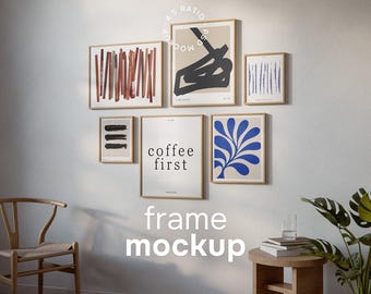 May include: A gallery wall arrangement of six light wood frames containing various abstract art prints and a central poster with the text coffee first. The prints feature geometric shapes, vertical lines, and botanical patterns in black, blue, and red.