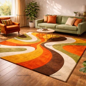 May include: A colorful, retro-style area rug with a wavy pattern in shades of orange, brown, yellow, and green. The rug is placed on a hardwood floor, and is surrounded by furniture and plants.