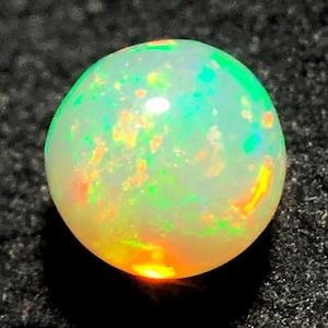 Ethiopian Opal 6.70mm 1.40 Carat White Opal Rainbow Fire Sphere