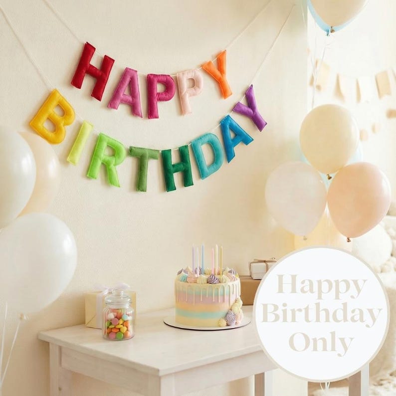 May include: A vibrant "HAPPY BIRTHDAY" banner adorns a wall above a table set with a cake, balloons, and gifts. The cake features pastel icing and candles. A jar of sweets and a gift box are also present. The scene evokes a celebratory atmosphere.