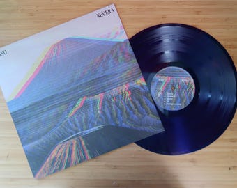 Custom vinyl record with printed center label + 350 gr paper insert or spineless Sleeve