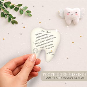 May include: A tooth-shaped letter with text, held by a hand, with a small tooth-shaped plush with wings. The letter reads "Dear Charlie" and is a Tooth Fairy Rescue Letter. The text at the bottom reads "TOOTH GONE MISSING? TOOTH FAIRY RESCUE LETTER."