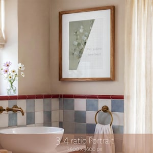 May include: A square wooden frame containing a white mat and a print featuring a botanical illustration of eucalyptus leaves. The print includes a grid overlay with the text PSD 3:4 RATIO SMART OBJECT. The frame is mounted on a beige wall.