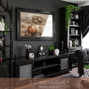 May include: A rectangular wall art print in a black ornate frame featuring a sepia-toned illustration of a rustic house, a large pumpkin, and two ghost figures. The text "PSD 3:2 Ratio Smart Object" is visible on the surface of the print.