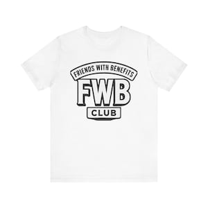 May include: A handmade wooden sign with the text "Welcome to our home" in a handwritten style. The sign is painted white with black lettering and a distressed finish, ideal for home decor.