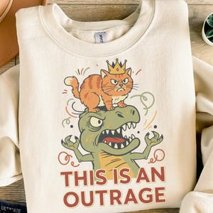 This Is An Outrage PNG SVG Digital Design, Grumpy Cat Dinosaur File, Funny Angry Kitty T-Rex Graphic, Quirky Pet Lover Gift, Instant