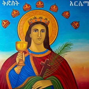 May include: An icon depicting a woman with a golden halo, wearing a crown and holding a chalice and a cross. The woman is dressed in a red and blue robe, with a green palm branch. Several crowns float in the background against a blue sky.