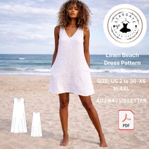 May include: A white linen beach dress with a V-neck and pockets. The dress is shown on a person standing on a sandy beach. The image includes the text "Linen Beach Dress Pattern" and size information.