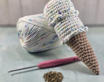 El sonajero de hierba gatera de Poppy, con espolvoreo y patada