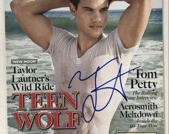 Taylor Lautner Autographed Rolling Stone Magazine, COA Included