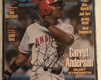 Revista "Sports Spectrum" completa, autografiada por Garret Anderson, con certificado de autenticidad incluido.