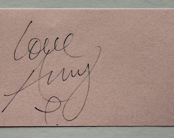 Amy Winehouse, página 2x5 autografiada, colección de dos generaciones