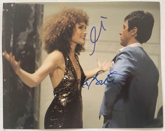 Fotografía brillante de 8x10 pulgadas autografiada por Al Pacino y Mary Elizabeth Mastrantonio de "Scarface", con certificado de autenticidad incluido.