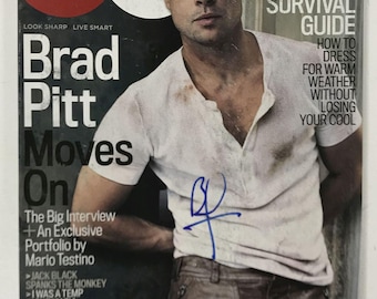 Revista "GQ" completa autografiada por Brad Pitt, certificado de autenticidad incluido.