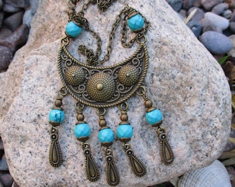Moroccan Boho Gypsy Inspired Small Bib Style Necklace with Faceted Turquoise Beads and Gold Tone Dangles  Moroccan Crescent Pendant Necklace
