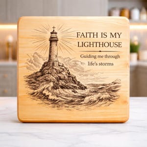 May include: A wooden chopping board featuring a lighthouse design. The lighthouse stands on a rocky outcrop, surrounded by waves. The text reads "FAITH IS MY LIGHTHOUSE, Guiding me through life's storms."