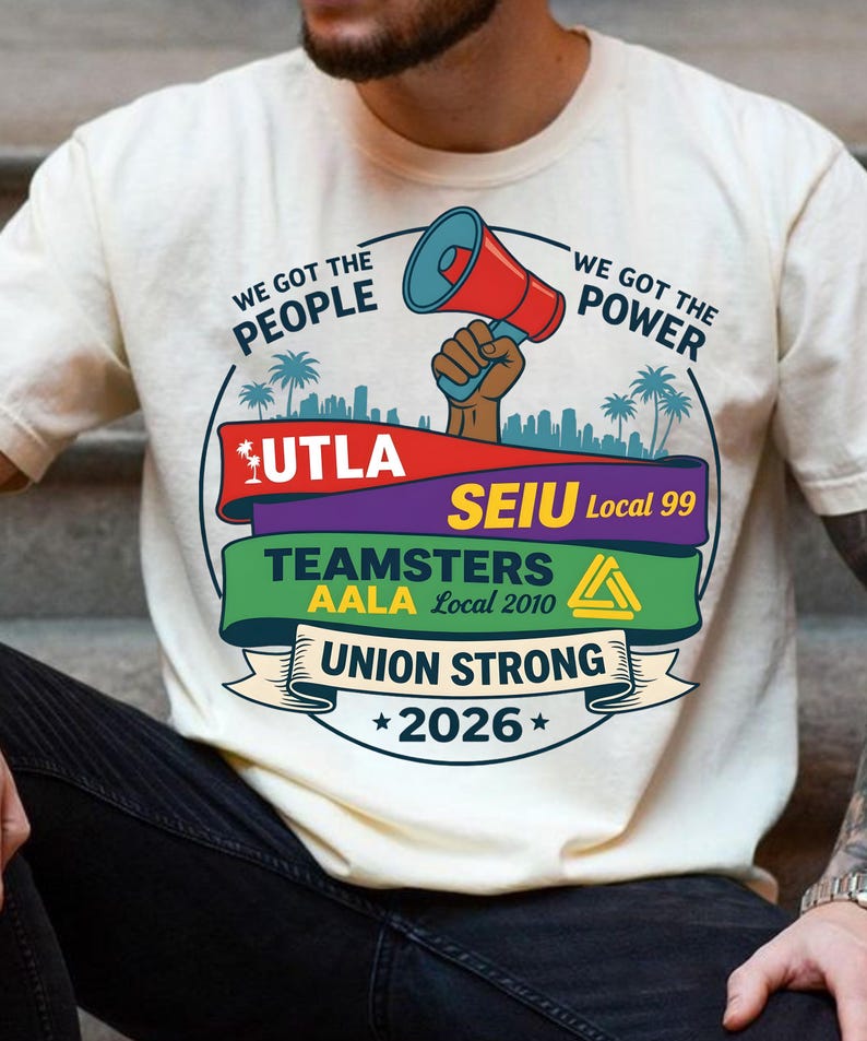 Labor movement PNG union strong workers rights protest design featuring a raised fist holding a red megaphone above a city skyline with palm trees, layered banners displaying UTLA SEIU Teamsters AALA and “Union Strong 2026” text, bold modern activist style with vibrant red, teal, green, and yellow colors, ideal for shirt sublimation, protest apparel, and digital download PNG file for union supporters and activists