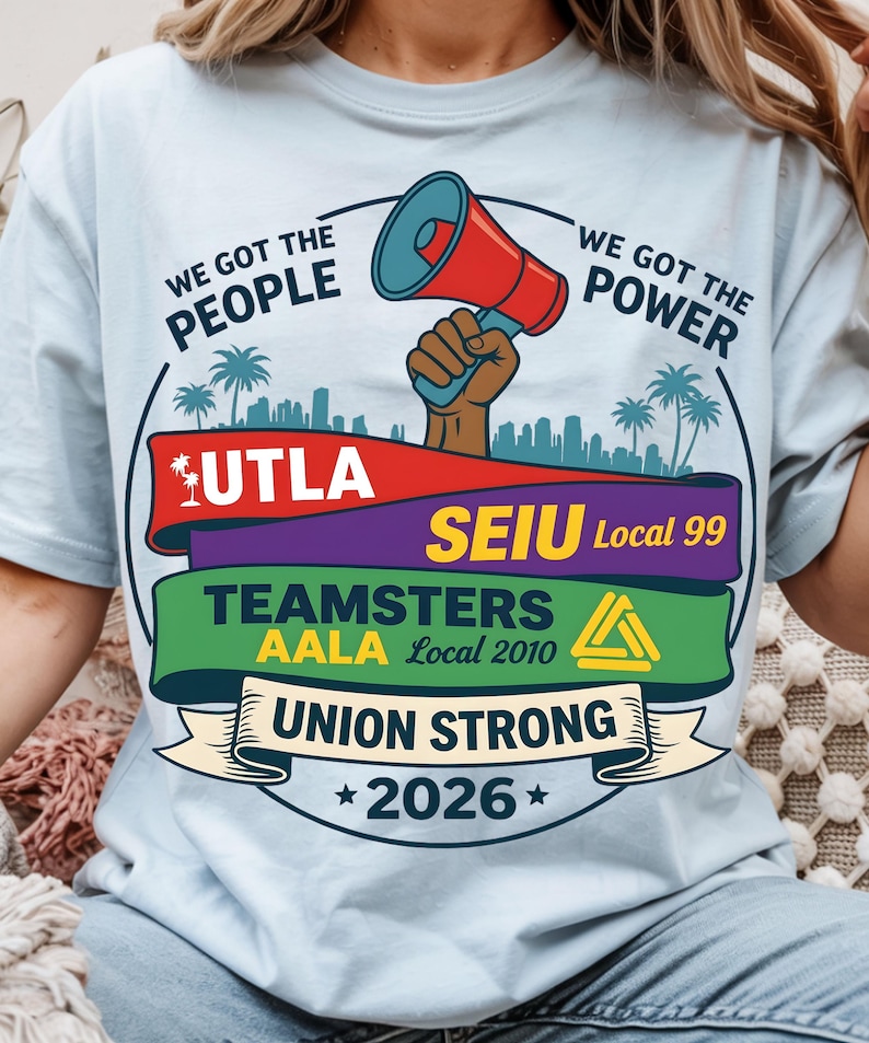 Labor movement PNG union strong workers rights protest design featuring a raised fist holding a red megaphone above a city skyline with palm trees, layered banners displaying UTLA SEIU Teamsters AALA and “Union Strong 2026” text, bold modern activist style with vibrant red, teal, green, and yellow colors, ideal for shirt sublimation, protest apparel, and digital download PNG file for union supporters and activists