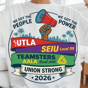 Labor movement PNG union strong workers rights protest design featuring a raised fist holding a red megaphone above a city skyline with palm trees, layered banners displaying UTLA SEIU Teamsters AALA and “Union Strong 2026” text, bold modern activist style with vibrant red, teal, green, and yellow colors, ideal for shirt sublimation, protest apparel, and digital download PNG file for union supporters and activists