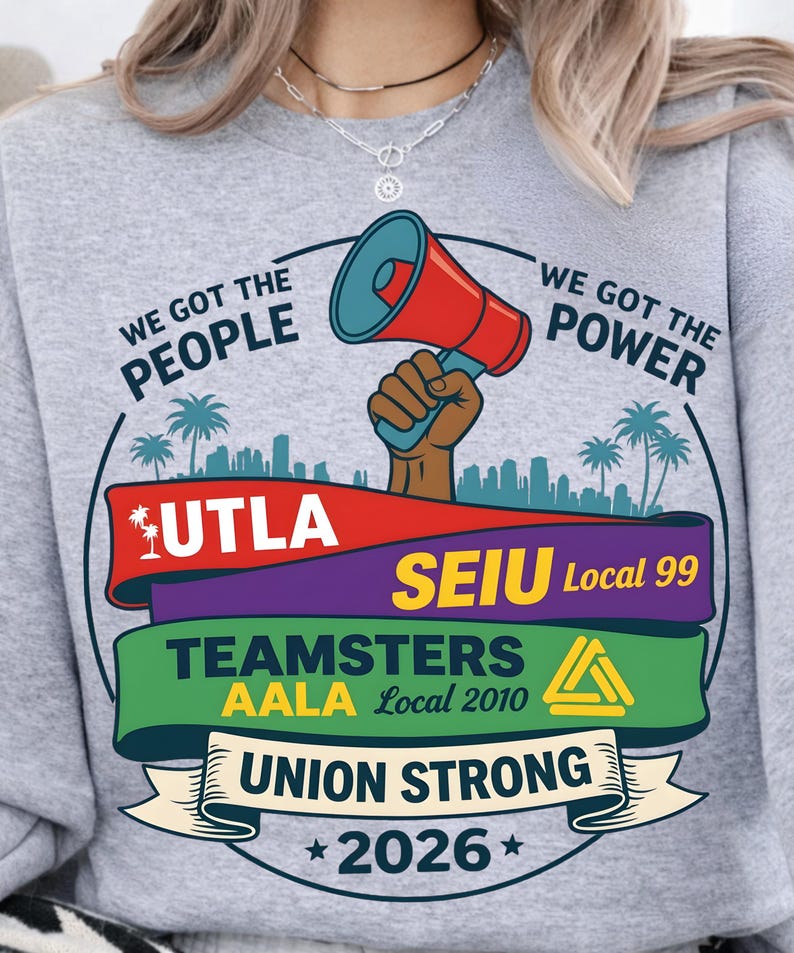 Labor movement PNG union strong workers rights protest design featuring a raised fist holding a red megaphone above a city skyline with palm trees, layered banners displaying UTLA SEIU Teamsters AALA and “Union Strong 2026” text, bold modern activist style with vibrant red, teal, green, and yellow colors, ideal for shirt sublimation, protest apparel, and digital download PNG file for union supporters and activists