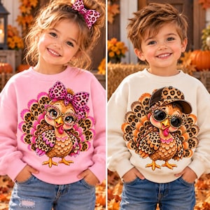 May include: A light pink sweatshirt featuring a turkey with a leopard print bow and glasses, and a cream sweatshirt featuring a turkey with a leopard print baseball cap and sunglasses. Both garments are paired with blue denim jeans.
