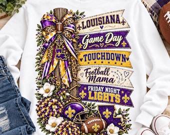 May include: A white crewneck sweatshirt featuring a graphic print of a wooden post adorned with a purple, gold, and leopard print bow, a football helmet, and pom-poms. Text includes LOUISIANA, Game Day, TOUCHDOWN, Football Mama, and FRIDAY NIGHT LIGHTS.